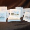 Note cards of city skylines.