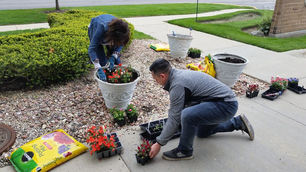 Lake County Housing Authority Planting Flowers.
