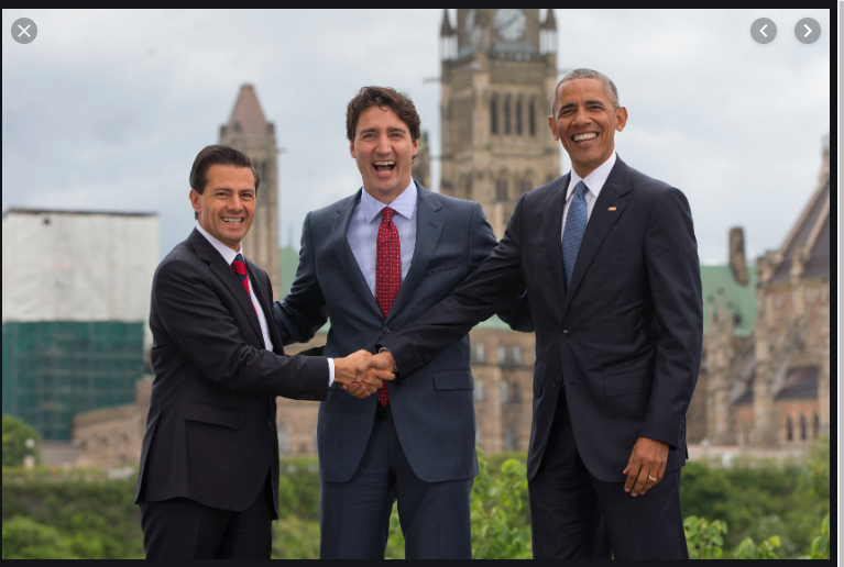 Presidents Nieto, Trudeau, and Obama shaking hands at the North American Leaders Summit in Ottawa, Ontario.