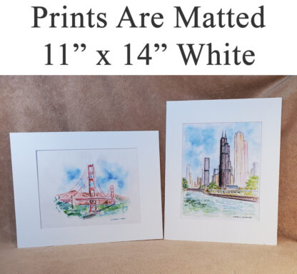 White matted landmark and city scene prints.